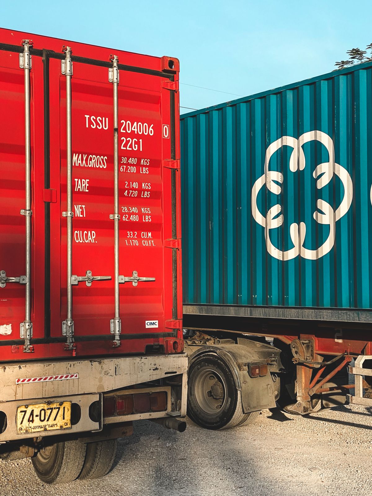Corrugated containers on trailers in Chiang Mai, Thailand — a ridged surface like this only suits large, simple shapes, never fine text