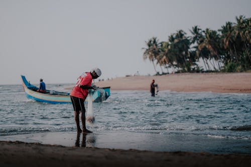 Foto profissional grátis de areia, barco, de pé