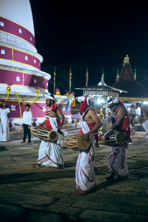 Free A vibrant night ceremony featuring drummers in traditional attire, emphasizing cultural heritage. Stock Photo