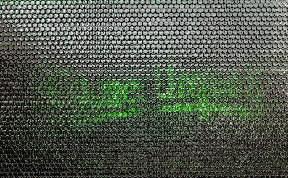 OpenClaw vs Cursor: Full-Stack App Build (2026) Close-up abstract honeycomb texture background with green illumination.