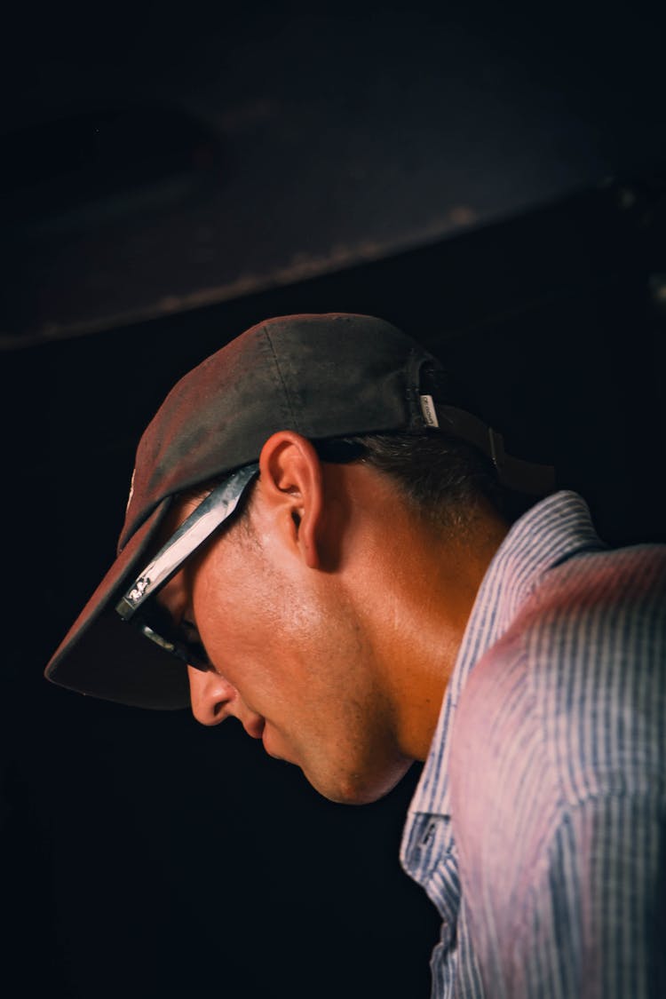 Man In Black Cap And Sunglasses