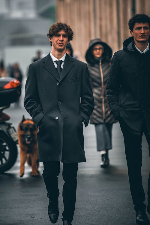 Pedestrian in Elegant Coat and Necktie