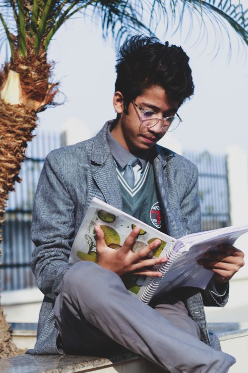 Student reading in Patna
