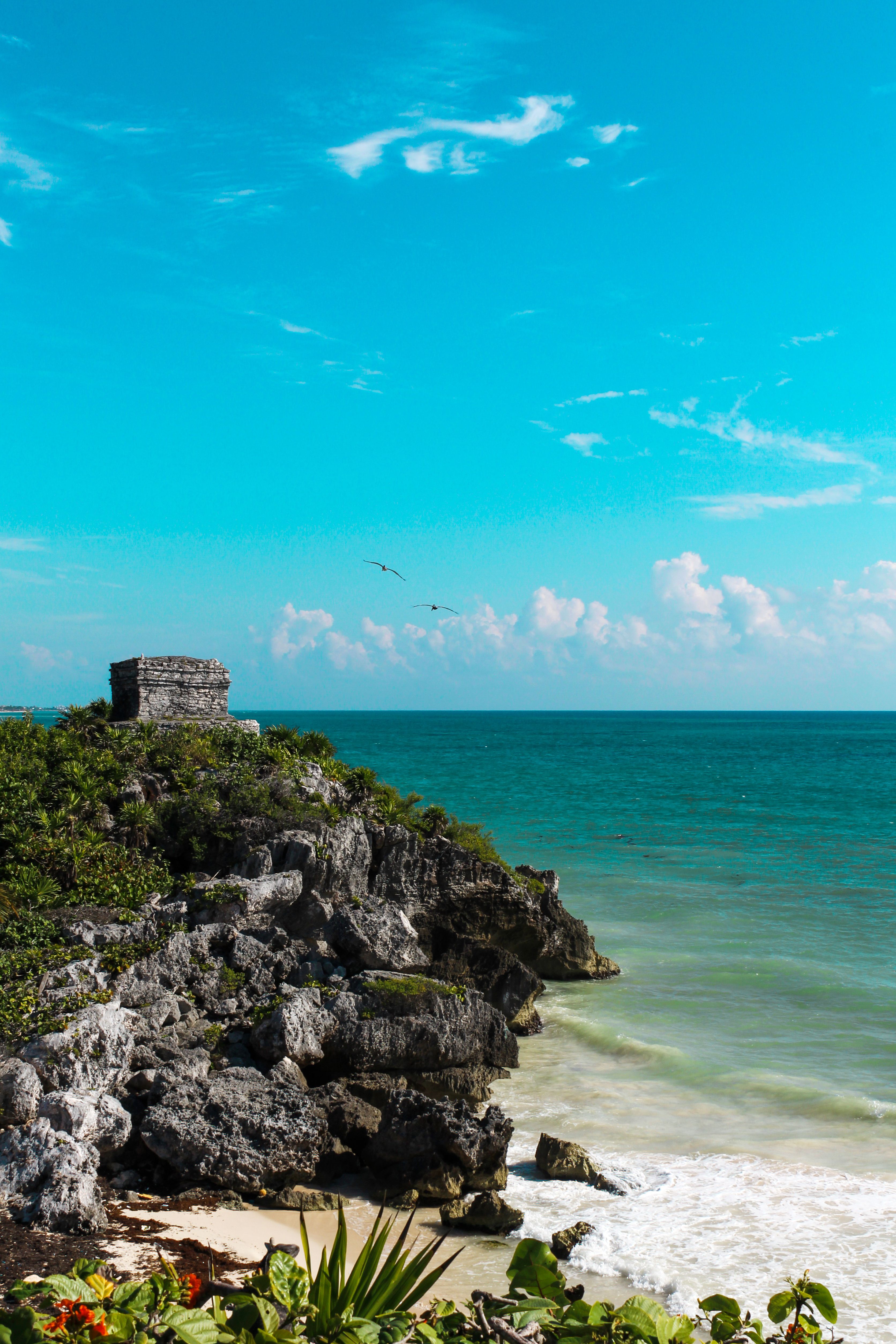 Maya ruins of Tulum on the cliff above the Caribbean Sea in Mexico