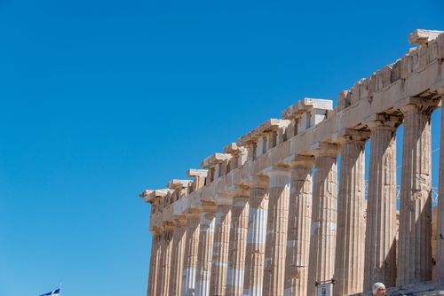 Free Majestic columns of the ancient Parthenon in Athens, Greece under a clear blue sky. Stock Photo