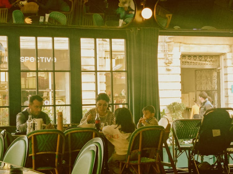 Family Eating At A Restaurant