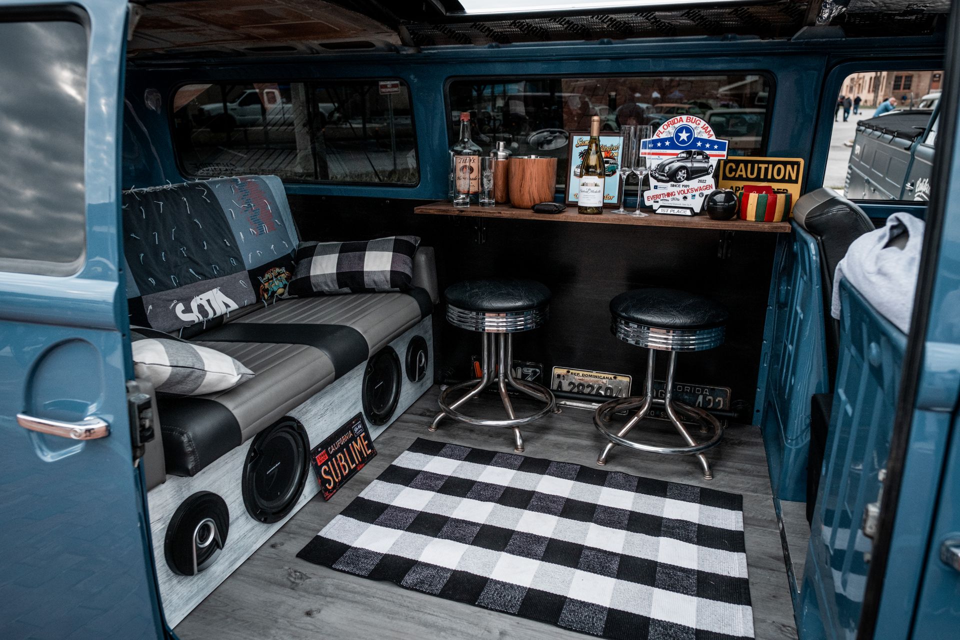 Explore the retro charm of a customized Volkswagen van with a unique interior bar setup.