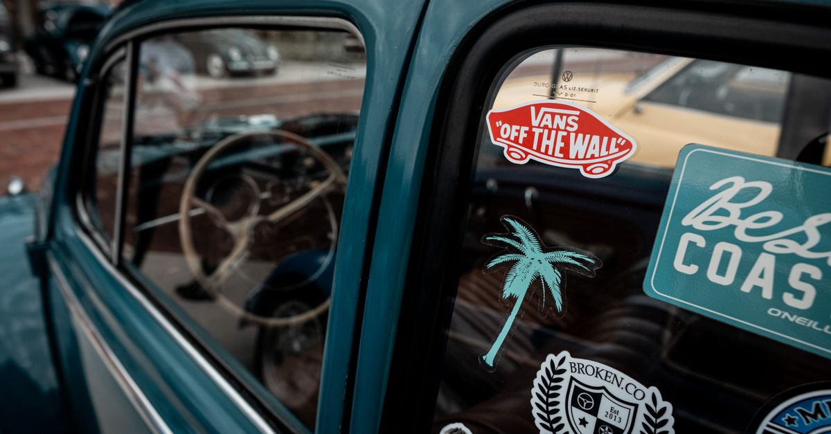 Free Vw Window Sticker Collection of Stickers on the Side Window of a Green Volkswagen Beetle ...
