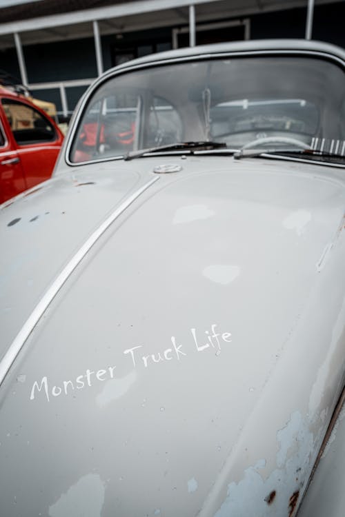 Classic White Volkswagen Beetle Hood with the Inscription Monster Truck Life