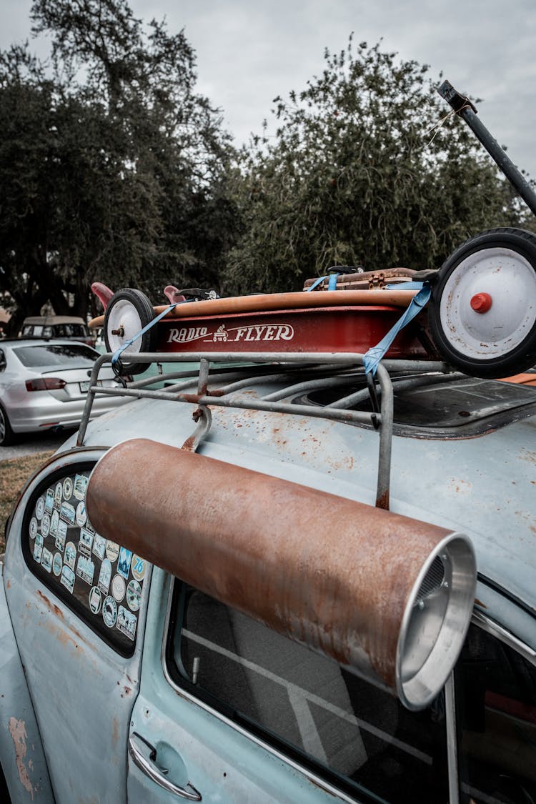 Radio Flyer Wagon On Vintage Volkswagen Beetle