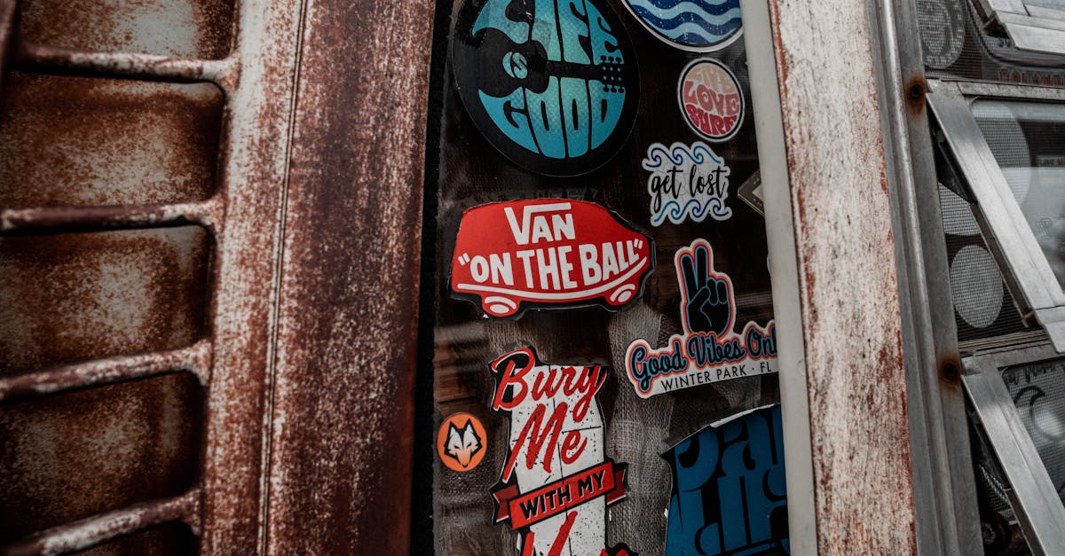 Stickers on Rusty Car · Free Stock Photo