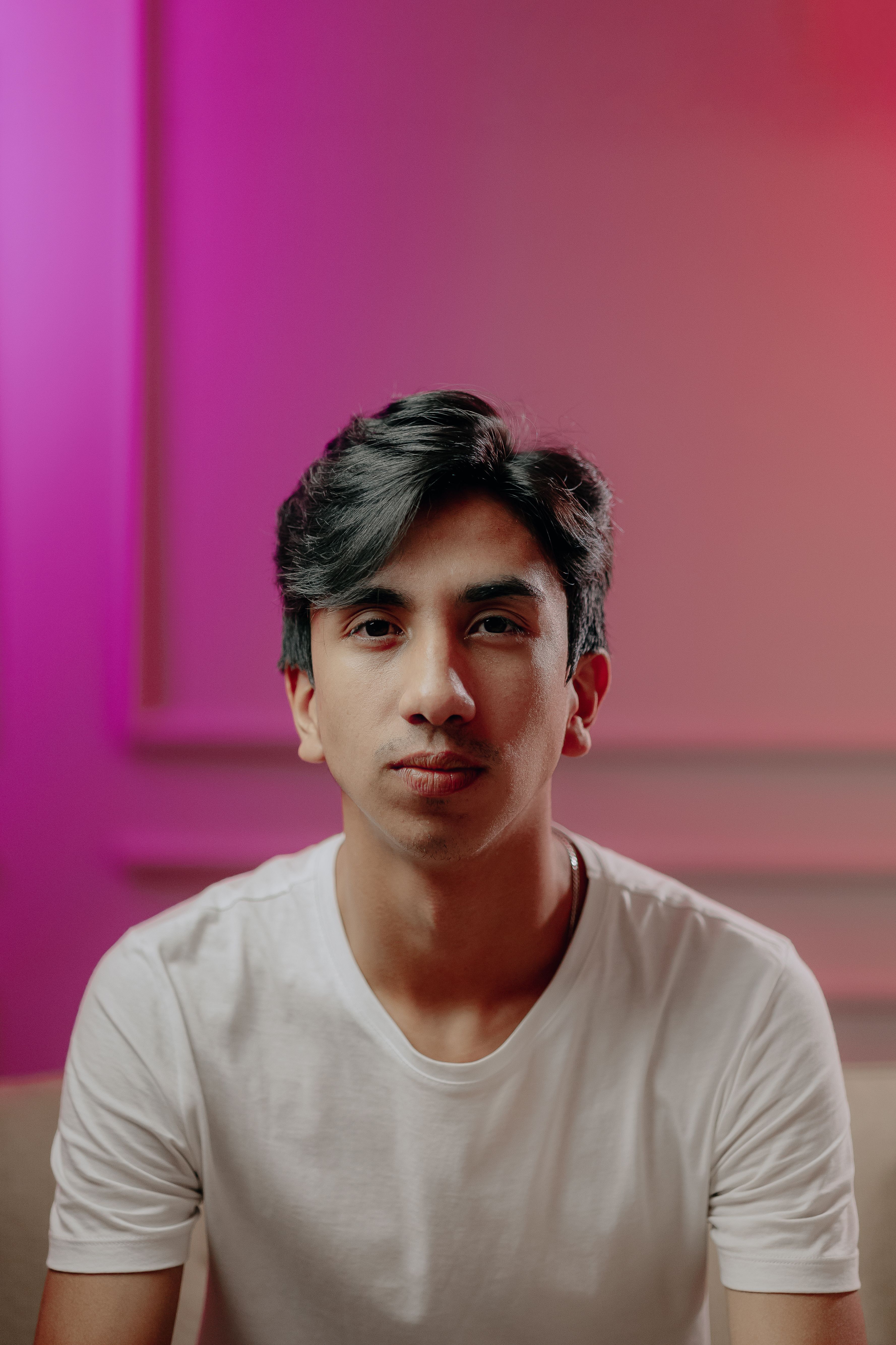 Portrait of a Young Man in a White T-shirt · Free Stock Photo