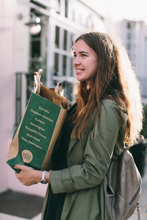 Free Woman Carrying Paper Bag Stock Photo