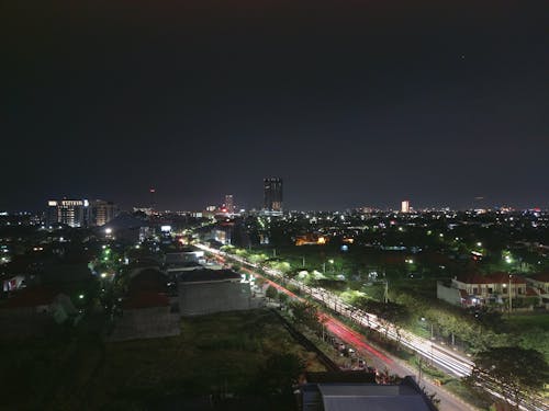 Foto stok gratis di malam hari, langit kota, pemandangan kota