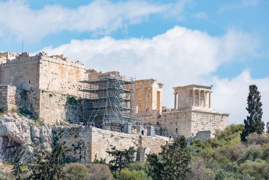 View of the Acropolis in Athens, showcasing ancient architecture and restoration efforts.