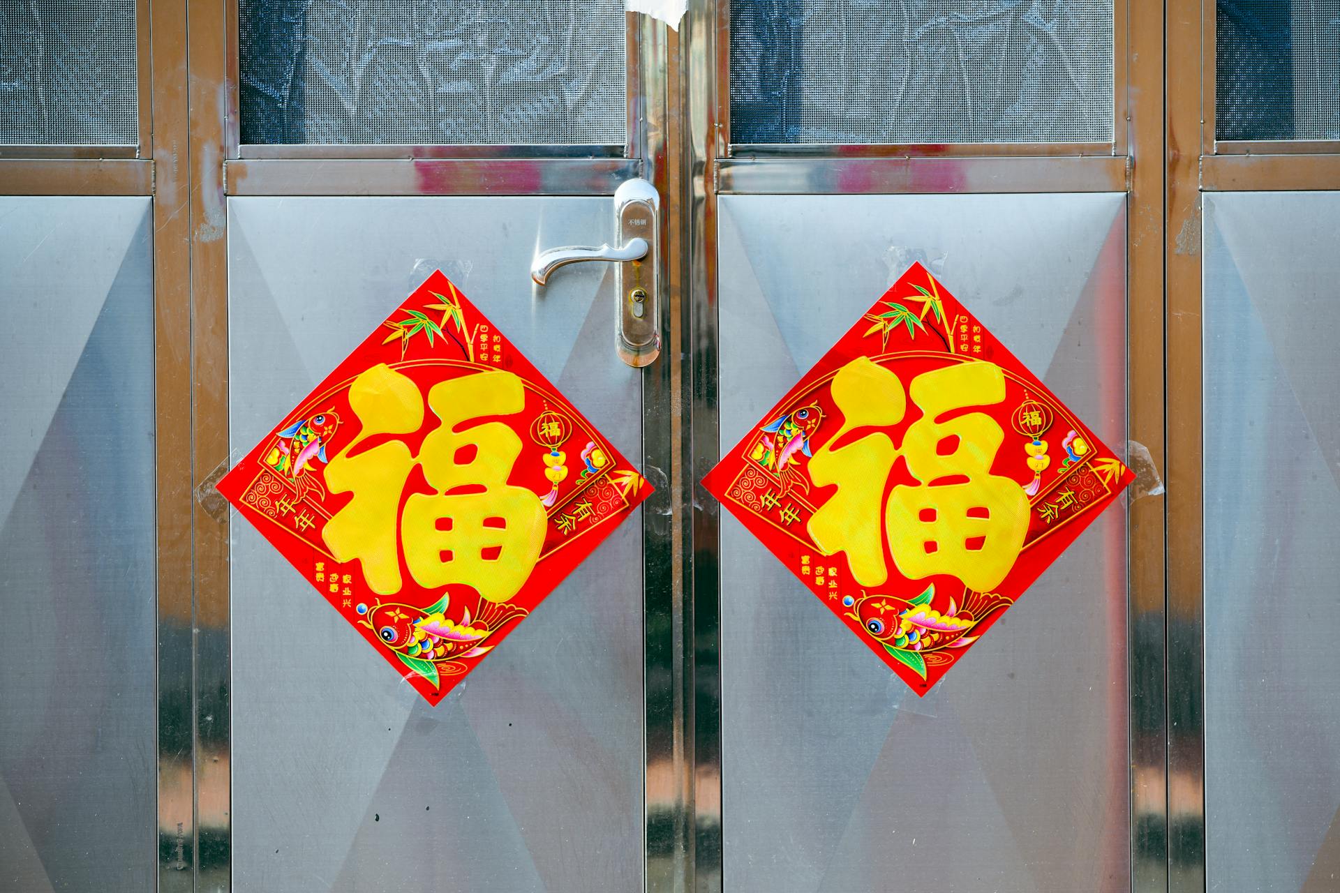 Colorful Chinese New Year door signs symbolizing good fortune and prosperity.