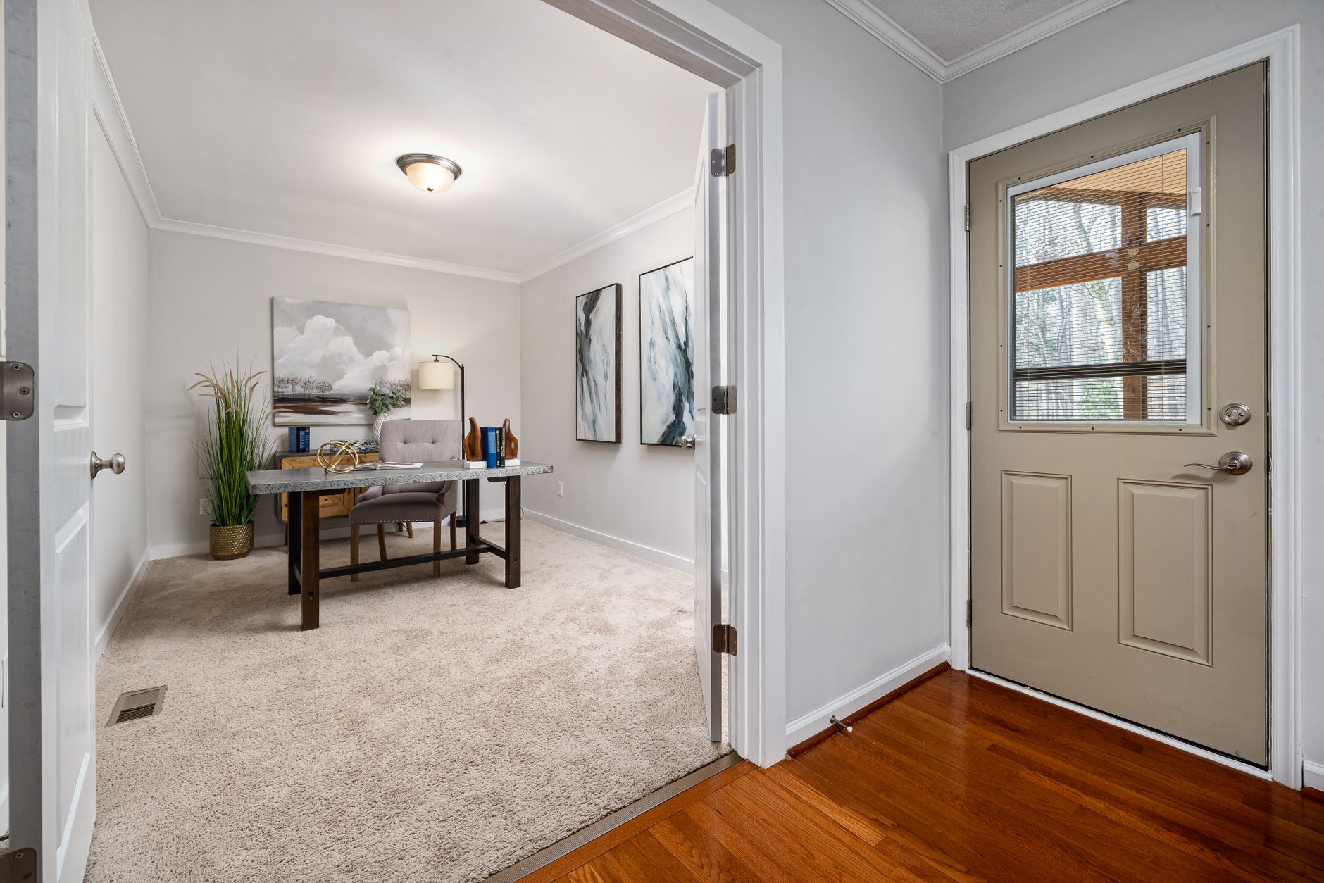 A quiet home office with a printed soccer bankroll ledger, calculator, fixtures, and responsible-gaming notes