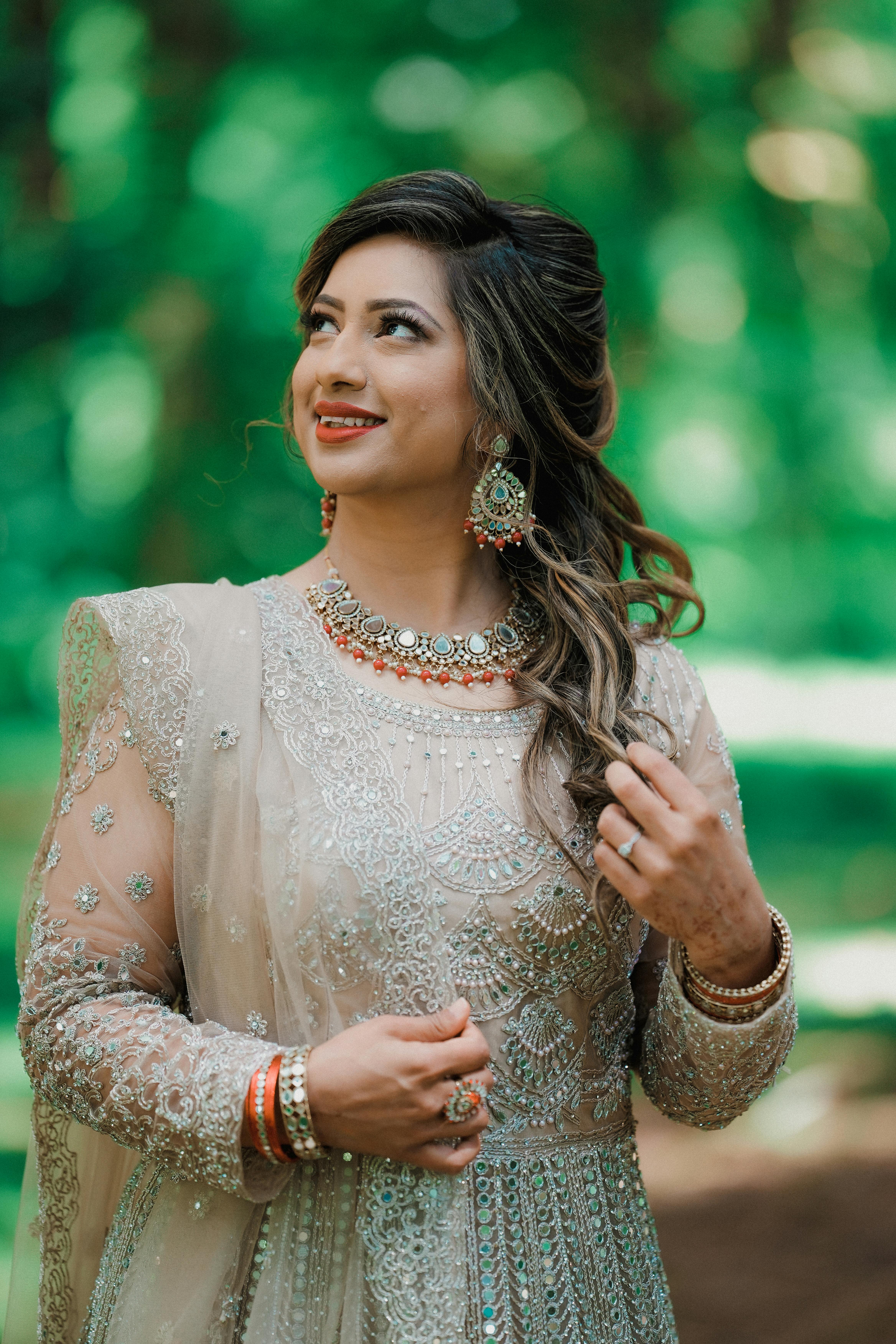 Smiling Couple in Traditional Wedding Costumes · Free Stock Photo