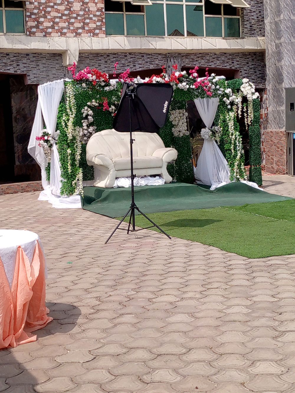 Outdoor wedding ceremony with floral arch