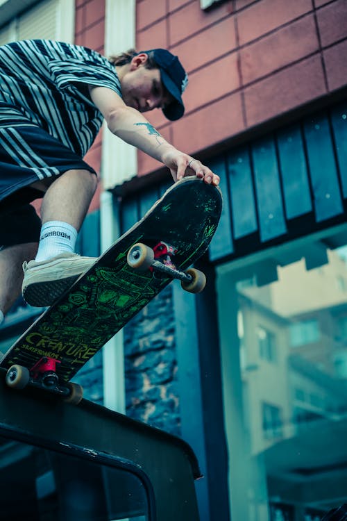 A Skateboarder Doing a Trick