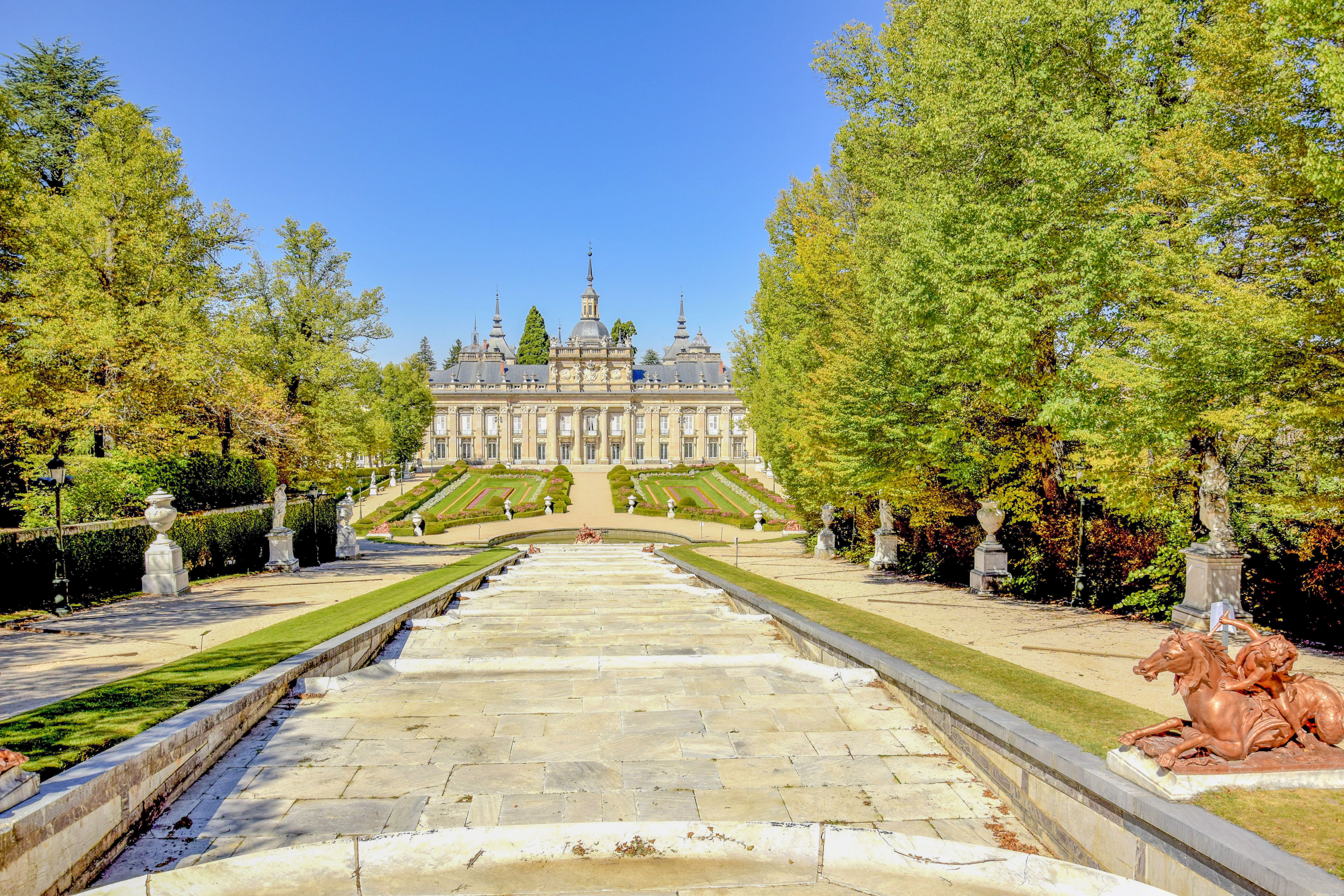 Baroque fountain jetting water in the gardens of the royal palace at La Granja de San Ildefonso