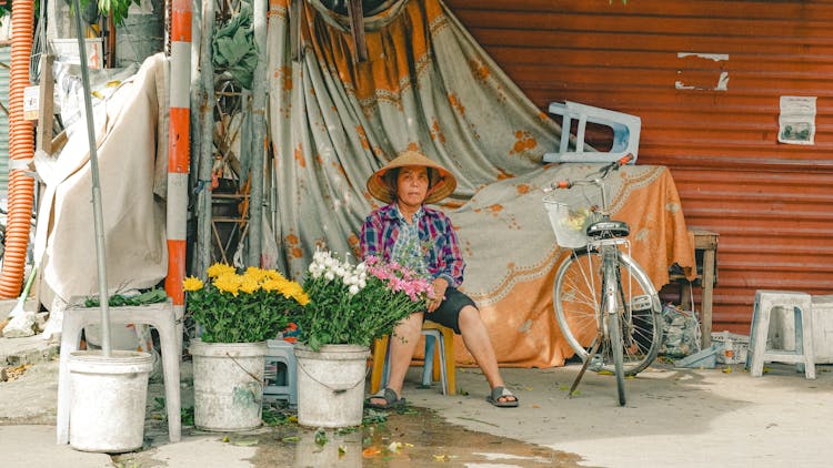 Female Farmer Selling Flowers