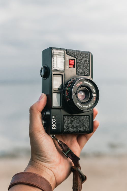 Analogue 35mm Camera in Hand