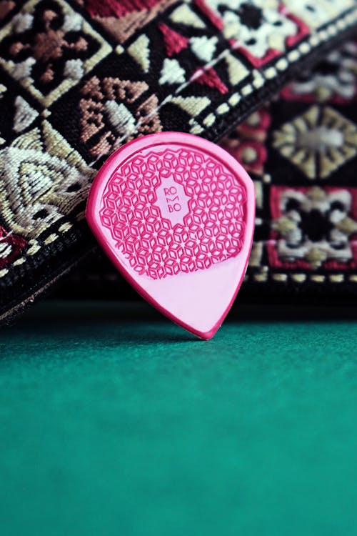 Close-up of Pink Guitar Pick