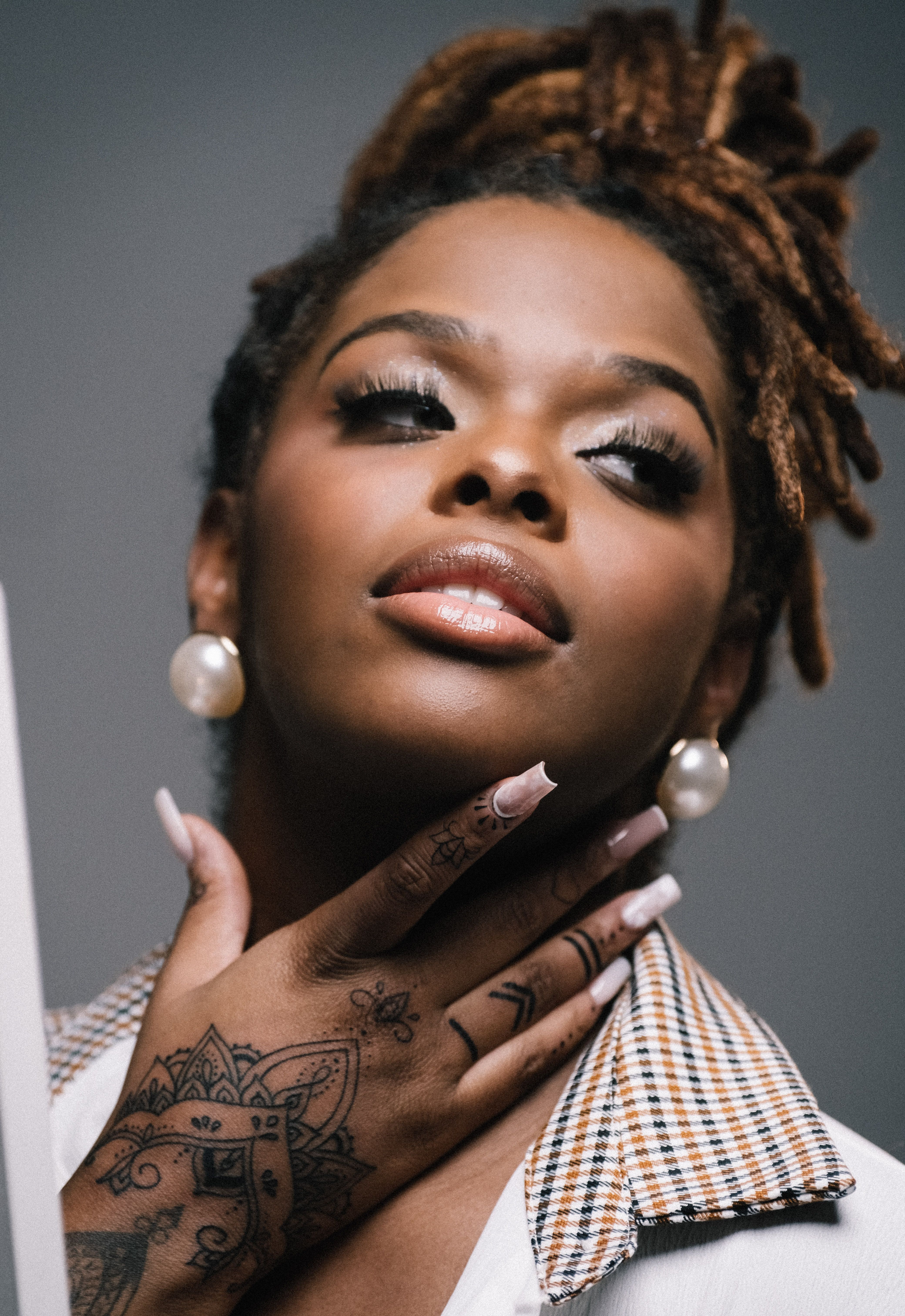 Close Up Photo of Woman with Hand Tattoo · Free Stock Photo