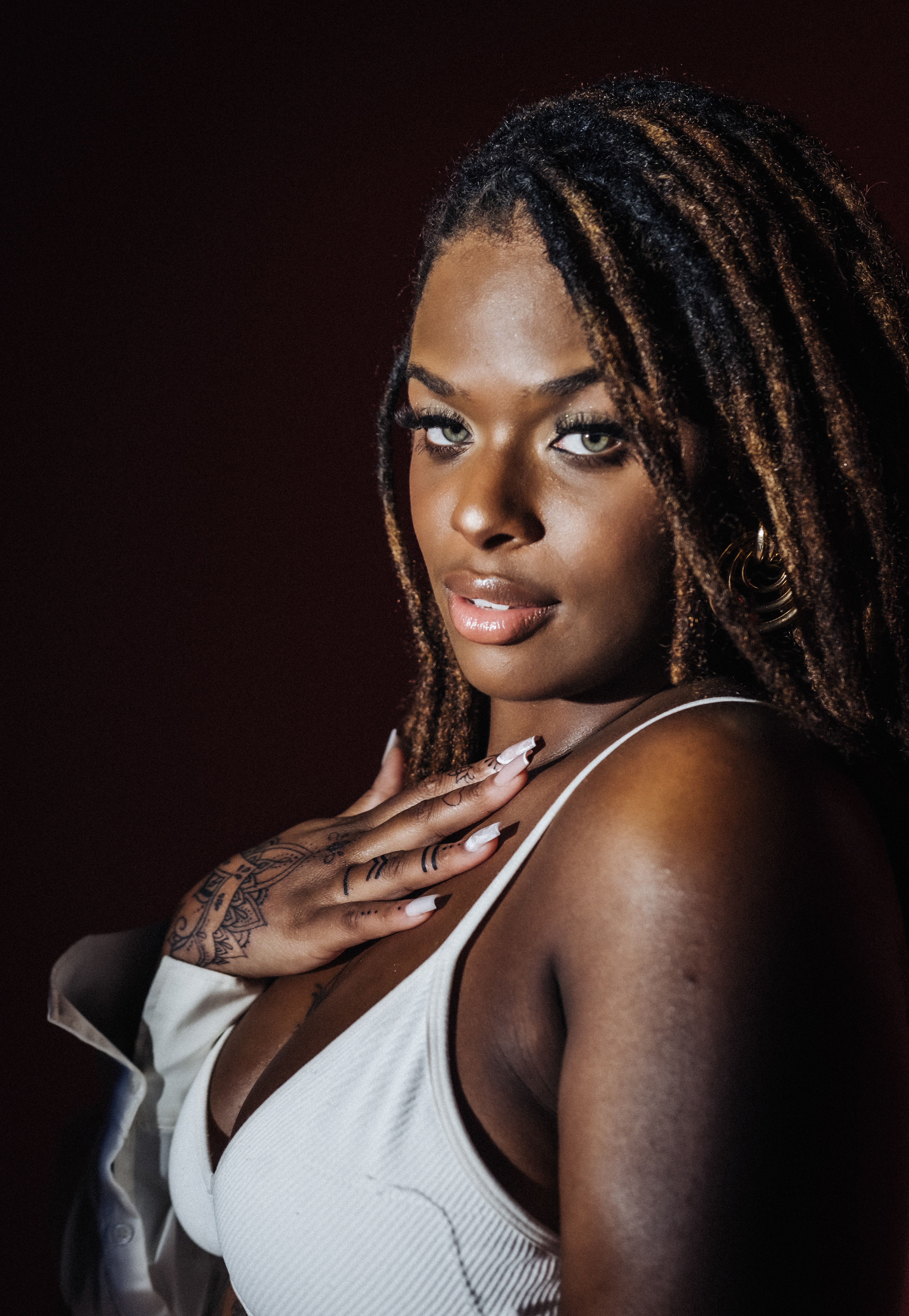 Close Up Photo of Woman with Dreadlocks · Free Stock Photo