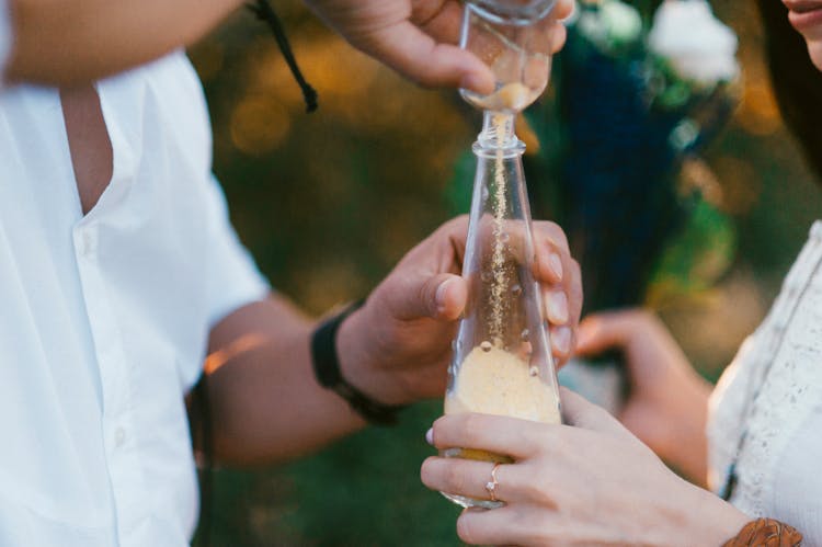 Pouring Sand To Bottle