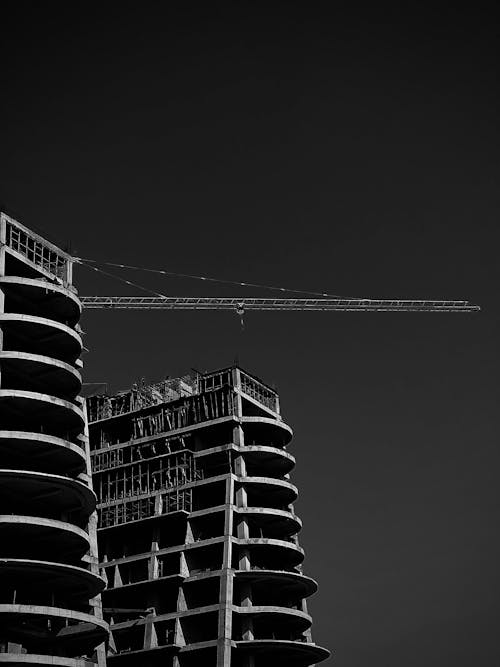 Consruction Crane and Buildings in Black and White