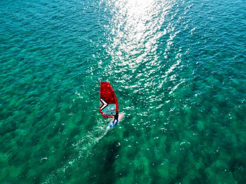 Darmowe zdjęcie z galerii z deska windsurfingowa, morze, pejzaż morski