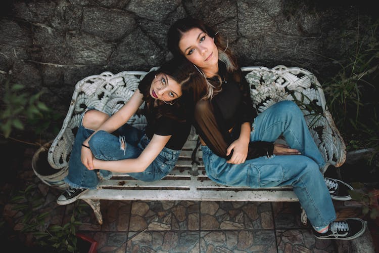 Women Sitting On A Bench