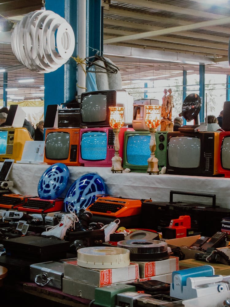 Old TV Sets In A Store 