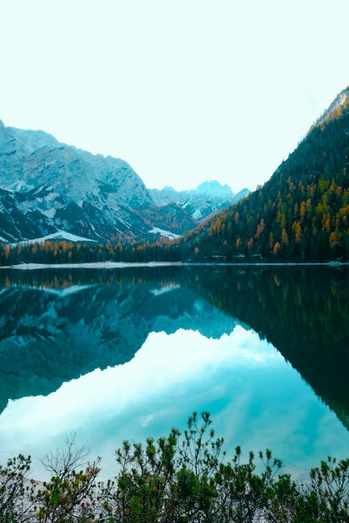Landscape Photography of Mountain and Body of Water