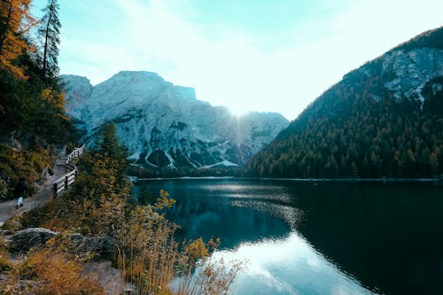 Free Mountain Reflecting on Body of Water Stock Photo