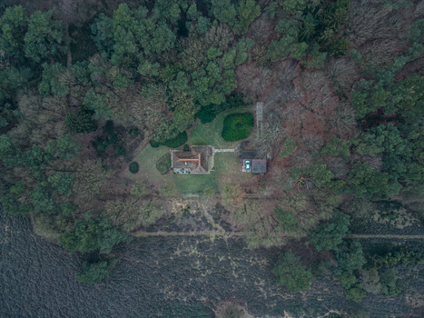 Aerial View of House in Forest