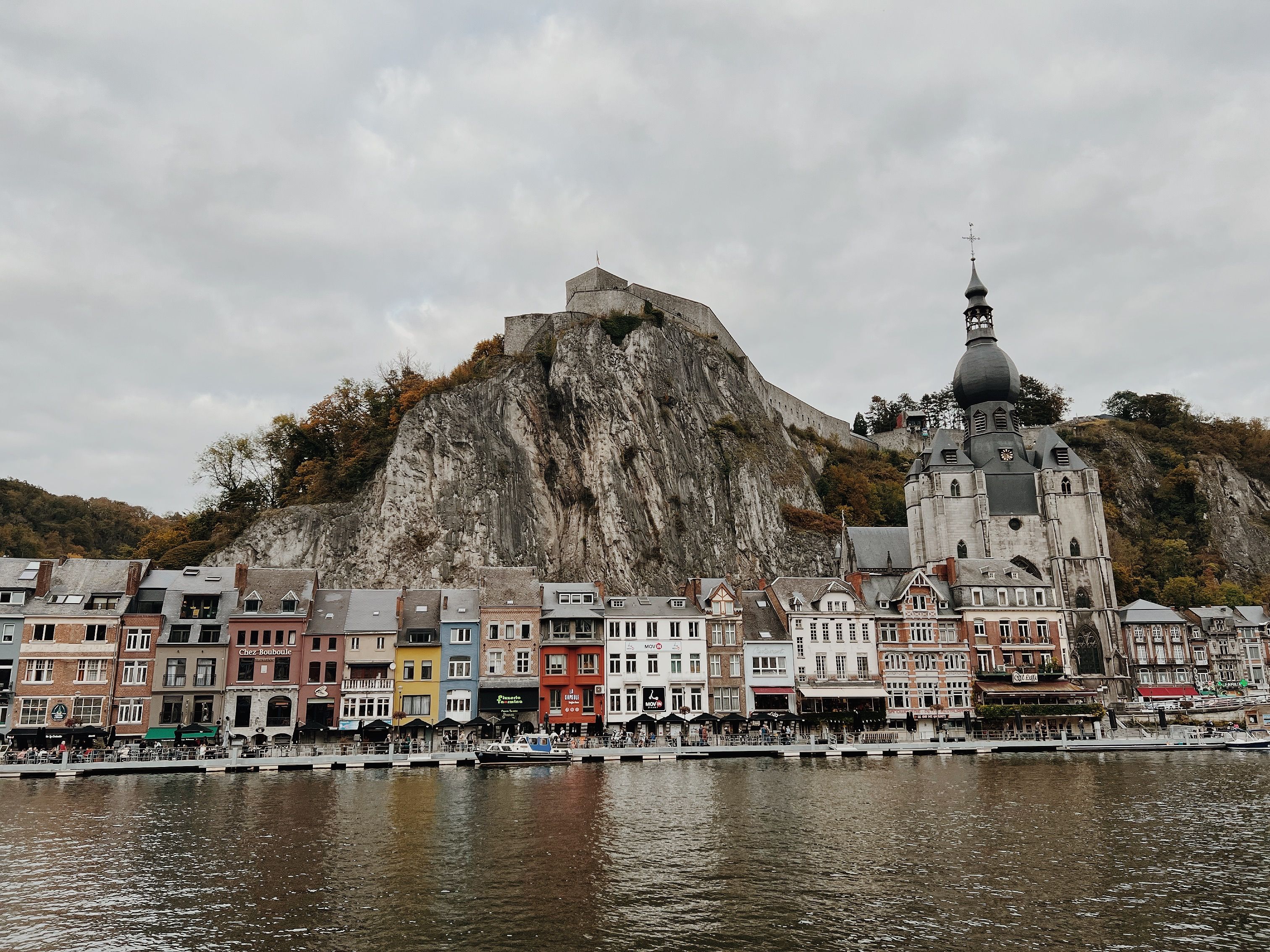 dinant belgium citadel rock cliff meuse river collegiate church notre dame panorama