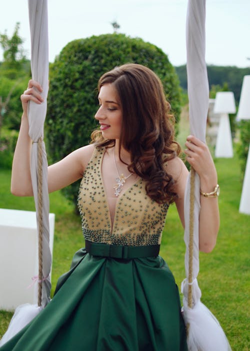 Woman Riding on Swing