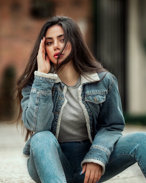 Beautiful woman wearing denim jacket, timeless casual portrait