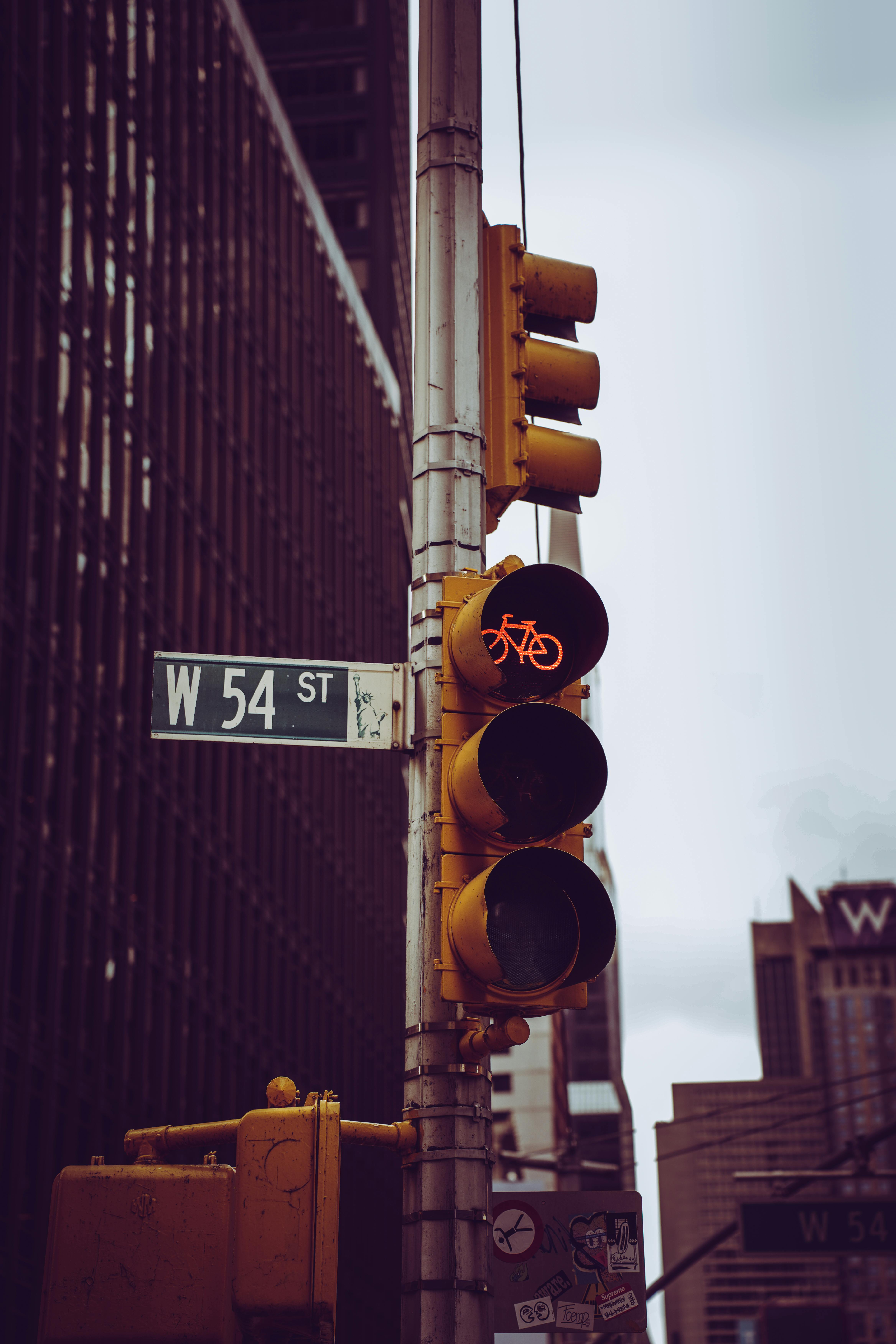 Traffic Lights and Sign on City Street · Free Stock Photo