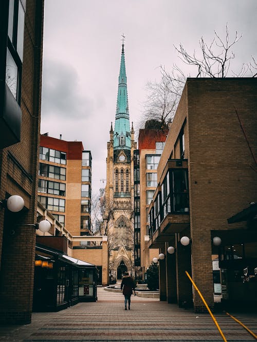 Person Walking Alone on an Alley