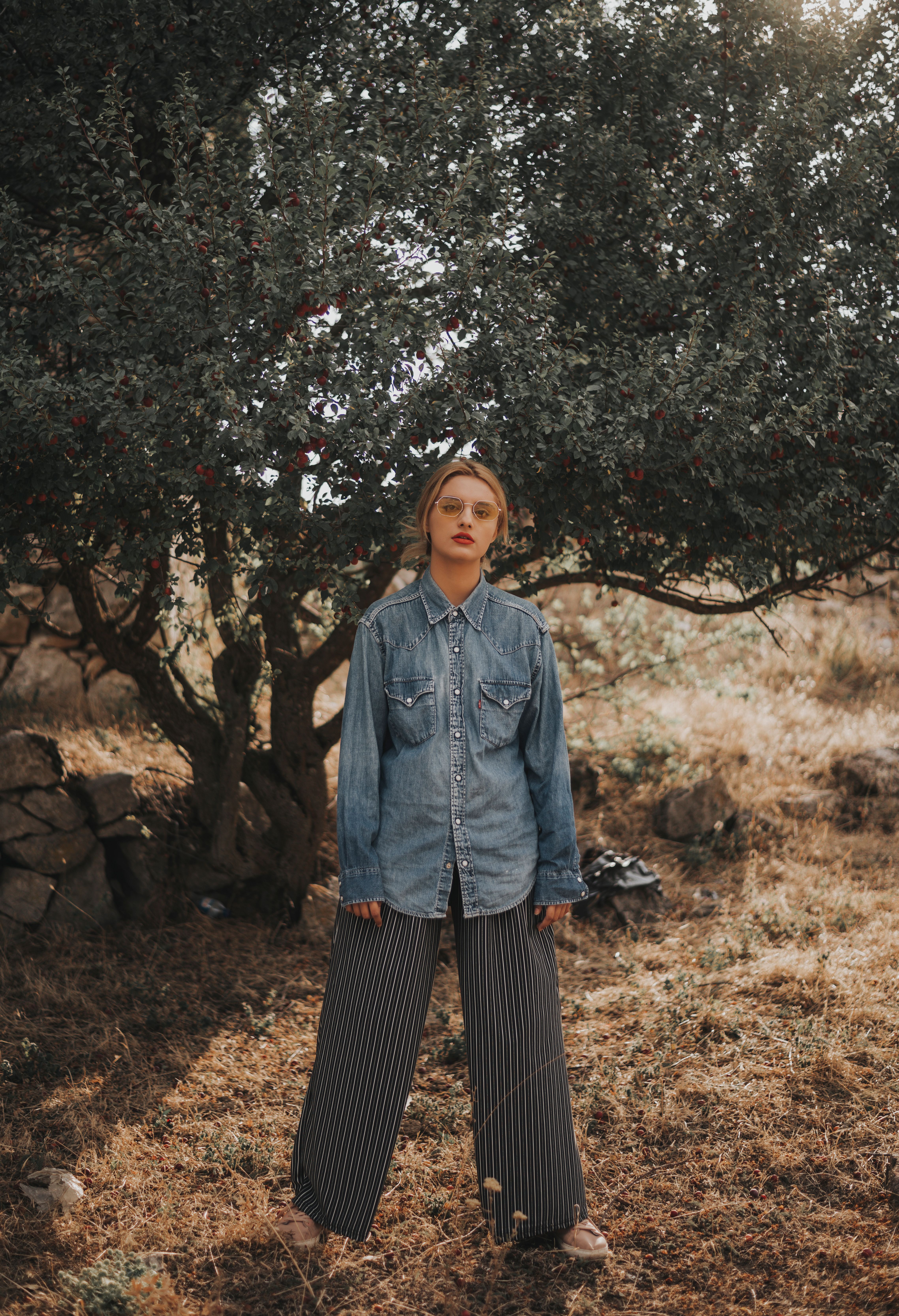 Woman Standing in Front of Tree · Free Stock Photo