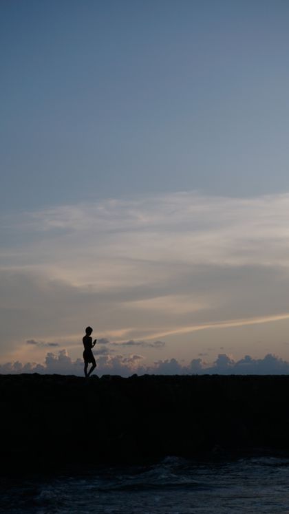 Runner at dusk, photo by Karl Junel Ani&ntilde;on Cagubcob on Pexels