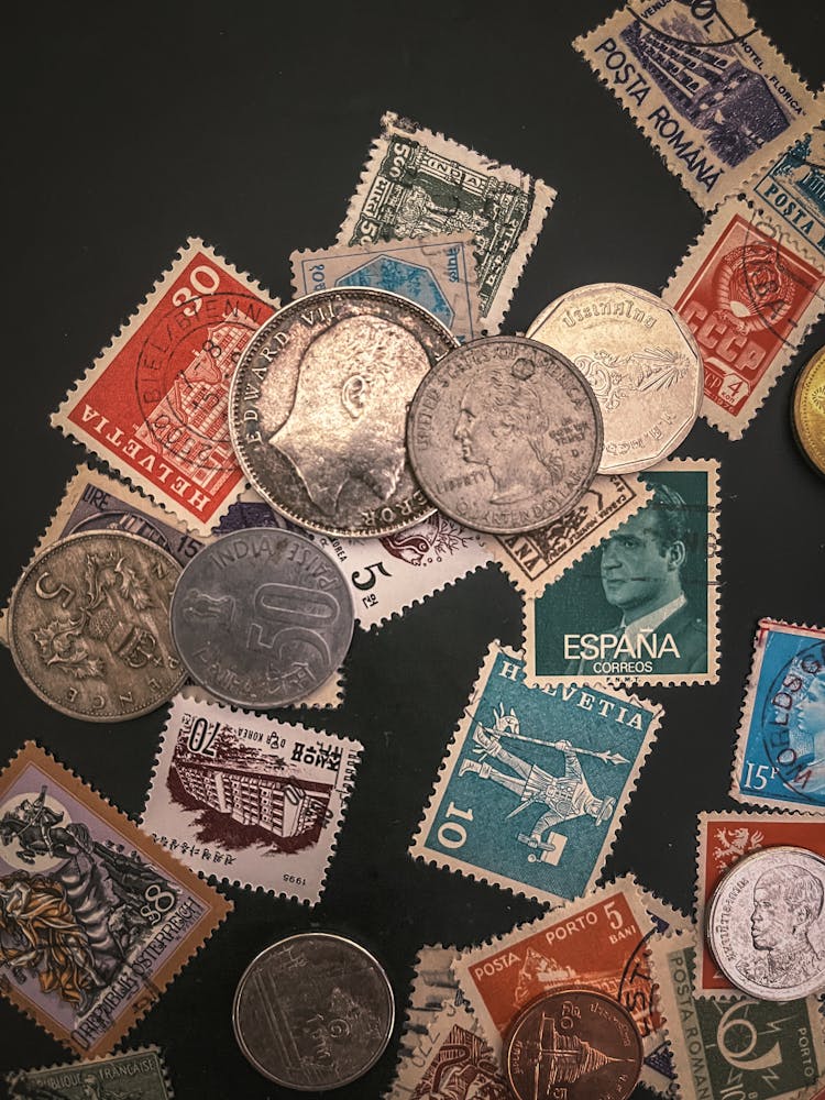 Variety Of Vintage Coins And Stamp