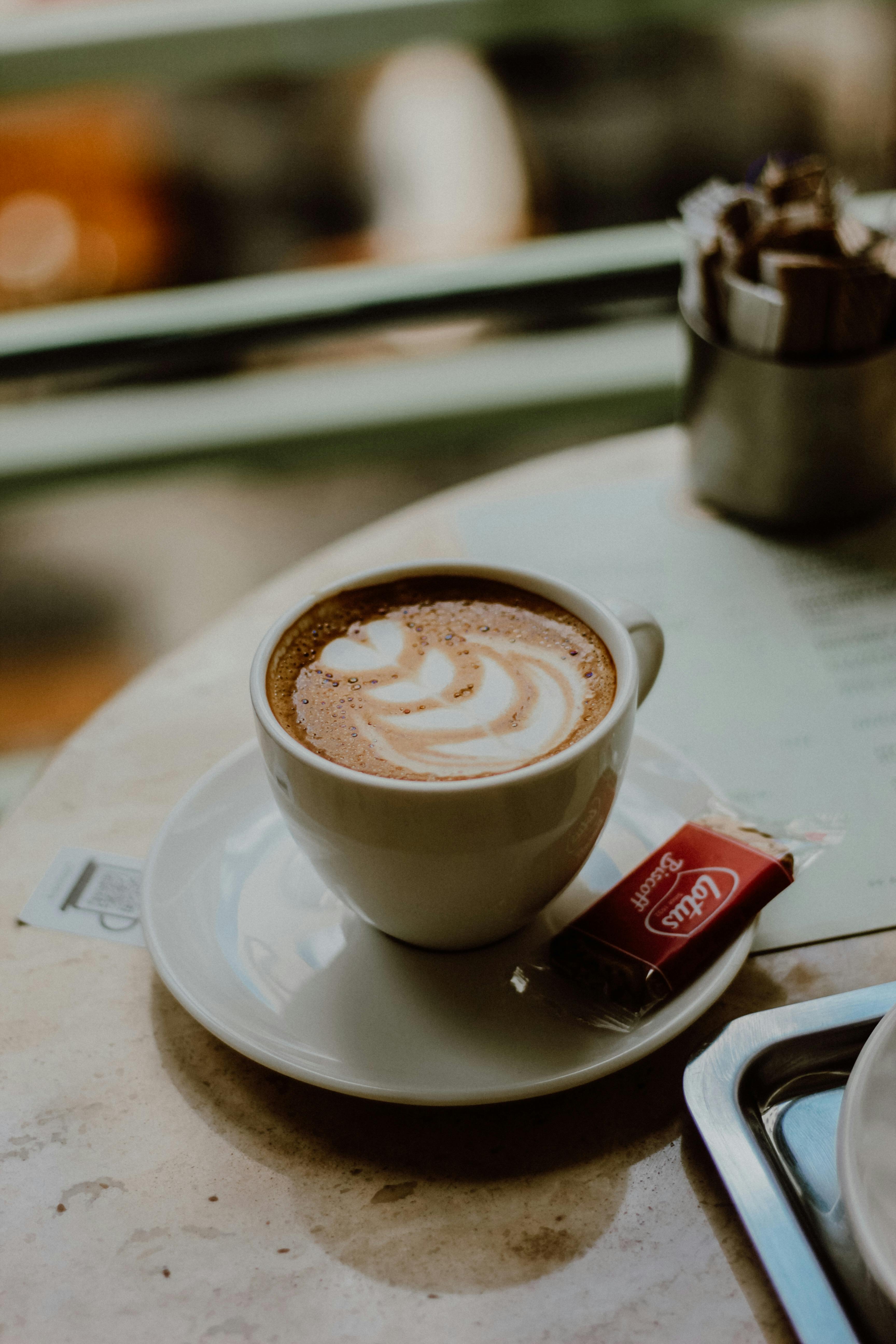 Cappuccino with chocolate sprinkles hi-res stock photography and