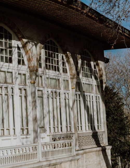 Free Charming vintage wooden house with traditional windows reflecting Istanbul's architectural style. Stock Photo