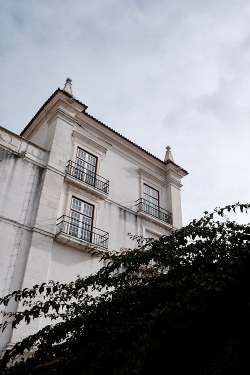 Foto profissional grátis de aparência, céu nublado, construção