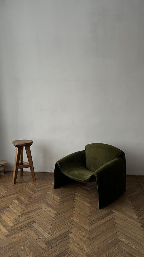 A Modern Armchair on a Wooden Parquet 